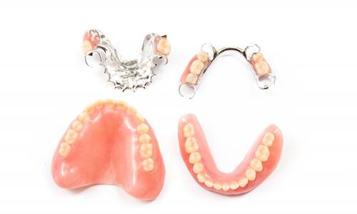 full and partial dentures against white background 