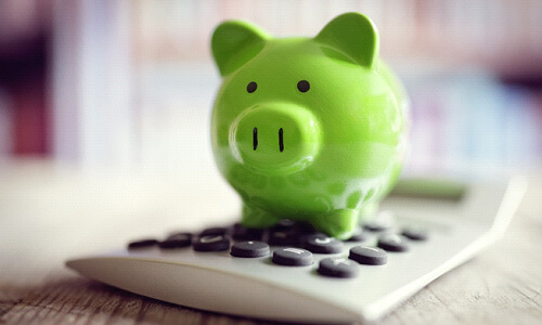piggy bank on a calculator