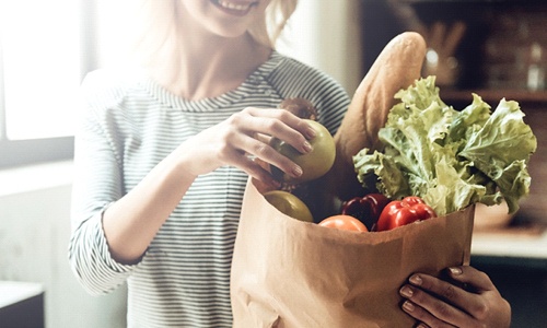 woman buying healthy food