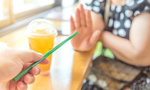 Woman saying no to straws