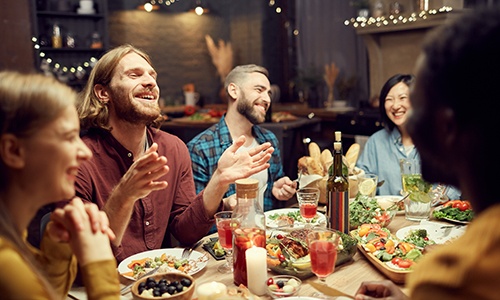 Group of friends enjoying meal together