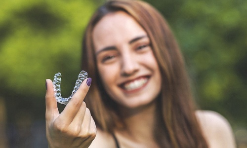 Woman smiling with Invisalign in Big Pine Key