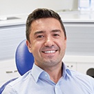 Smiling man in dental chair