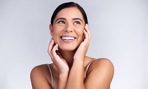 Smiling woman with beautiful, youthful complexion