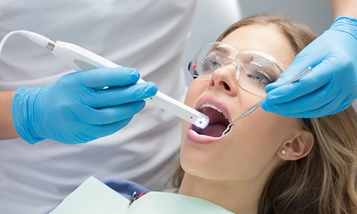 Dentist capturing intraoral images