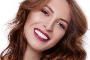 Woman with an attractive smile after cosmetic dentistry in Marathon.